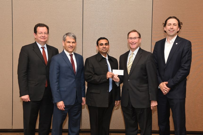 Stratford Chapter's Usman Asif presents VFF Check at Forum 74